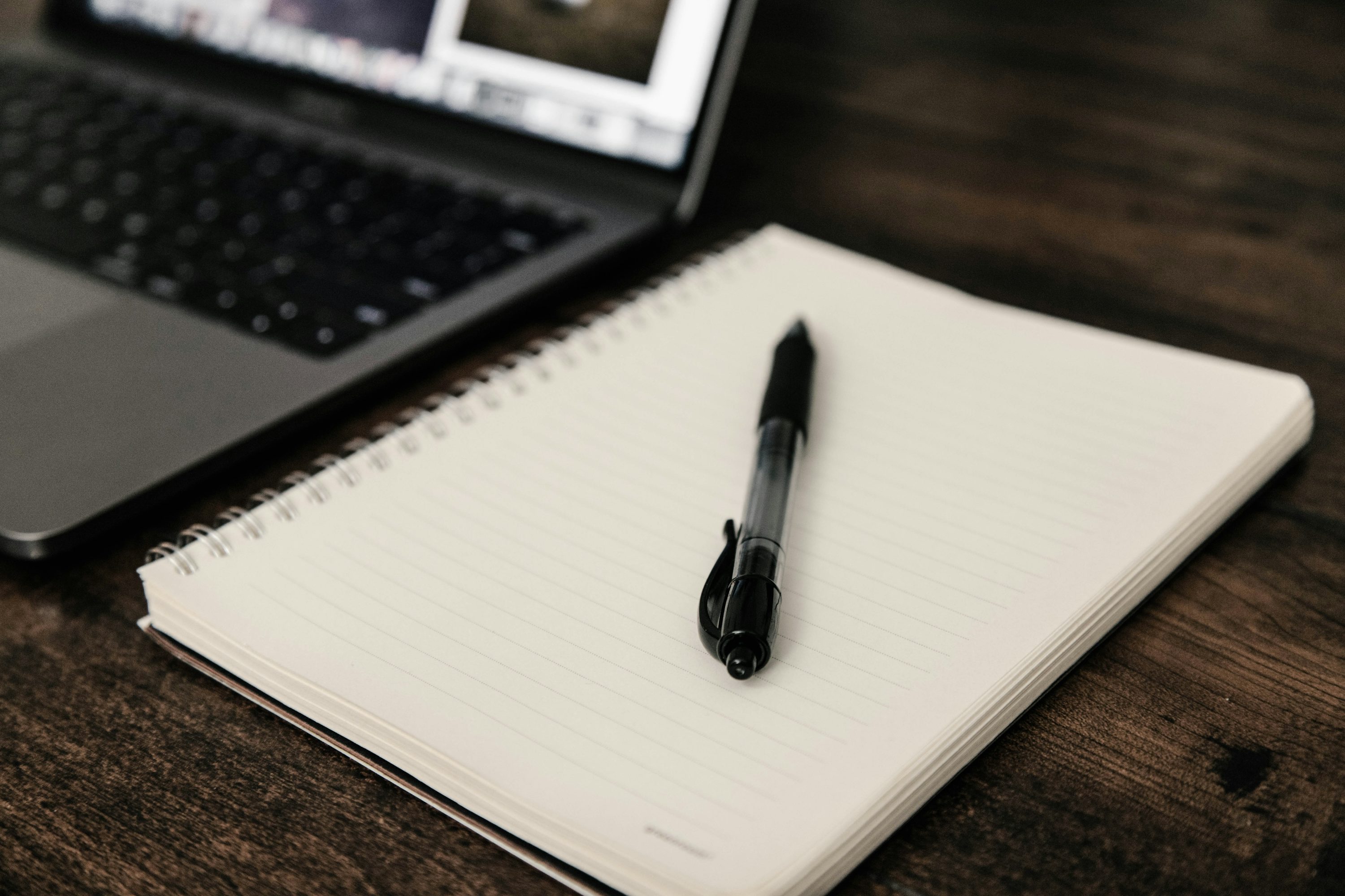 Notebook and pen on a desk